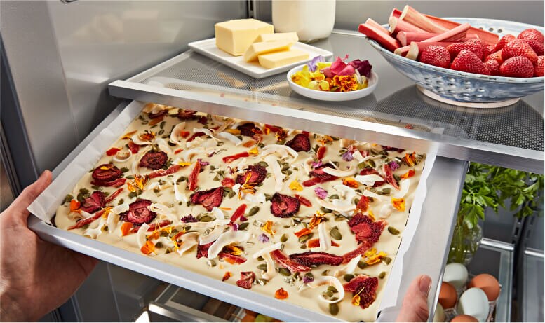 Placing cookware into Under-Shelf Prep Zone